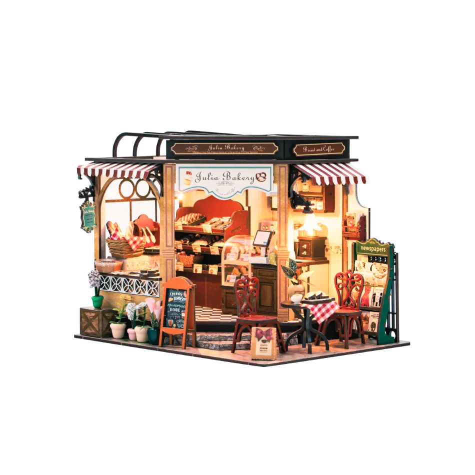 Model of a bakery shop with detailed interior on a white background