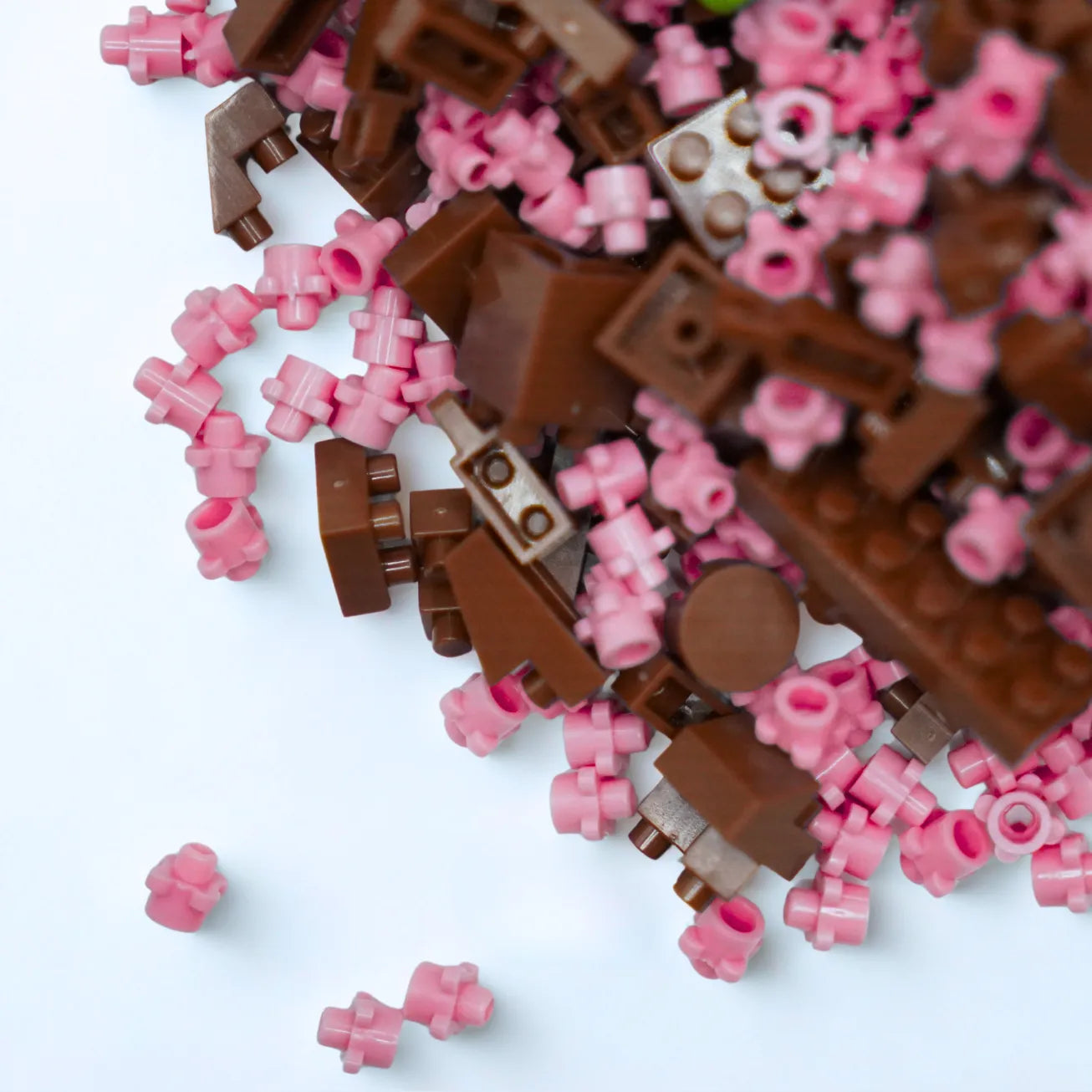 Close-up of brown and pink building blocks on a white background