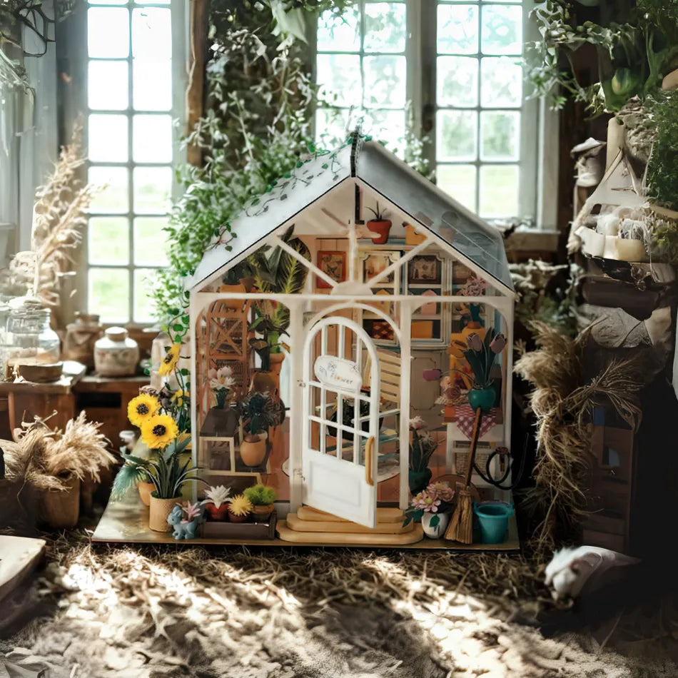 Miniature dollhouse with indoor plants and decor in a bright room.
