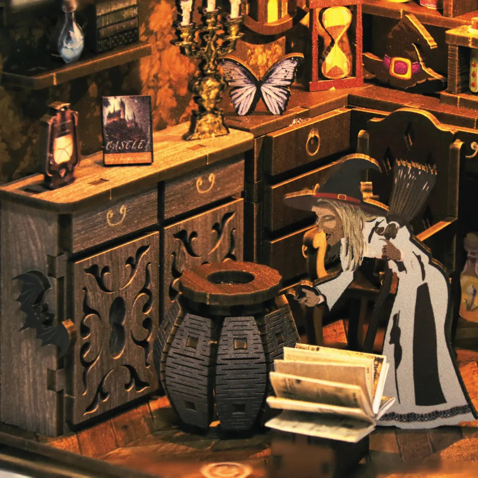 Wooden desk with decorative items including a lamp, books, and a mask.