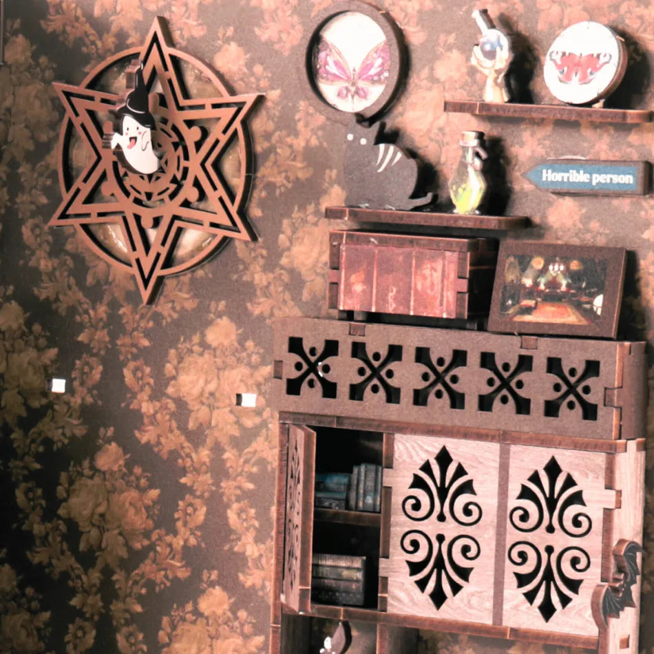 Decorative wall with wooden shelf and wall art against a patterned wall.