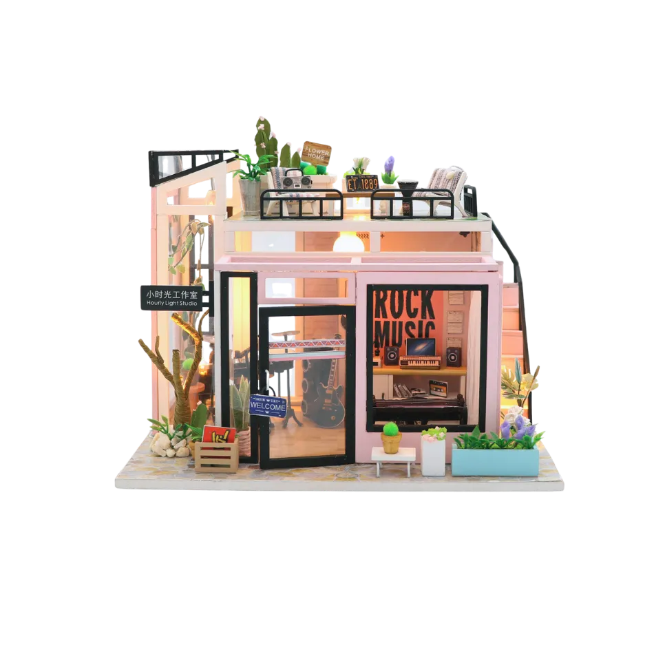 Model of a small music store with plants and furniture on a white background
