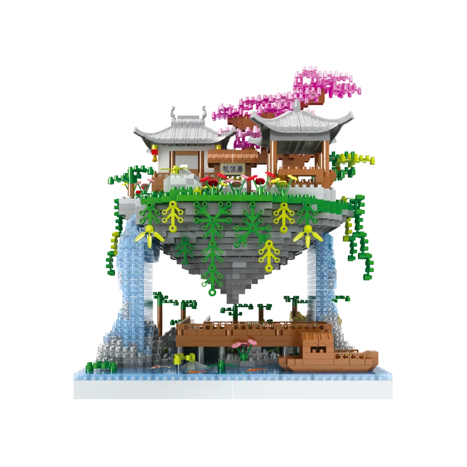 Toy architectural model with buildings, trees, and a boat on a white background