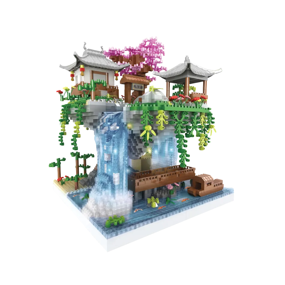 Model of a traditional Chinese landscape with buildings and trees on a white background