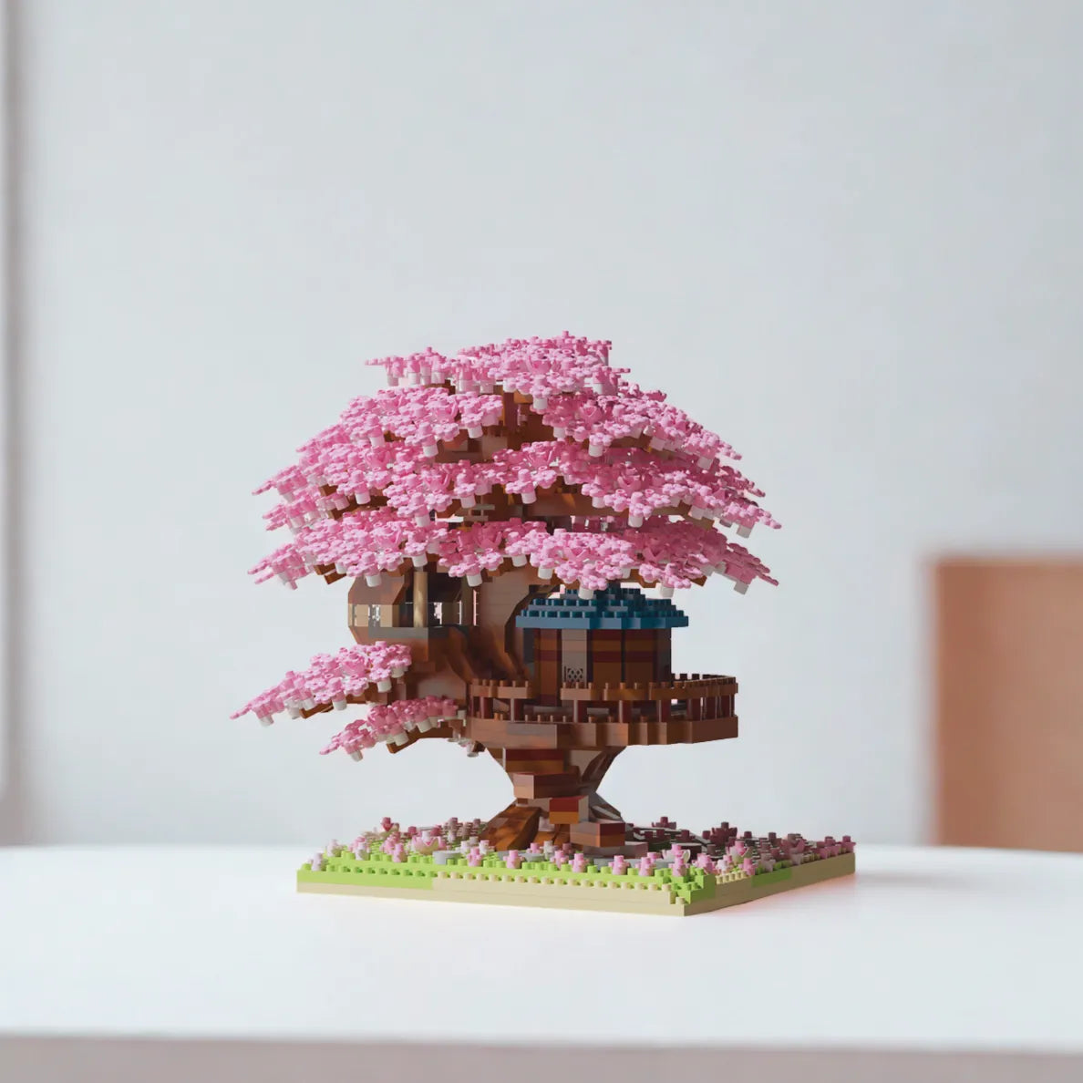 Cherry blossom tree building block pieces on a white background — pink sakura DIY block set for crafting and home décor.