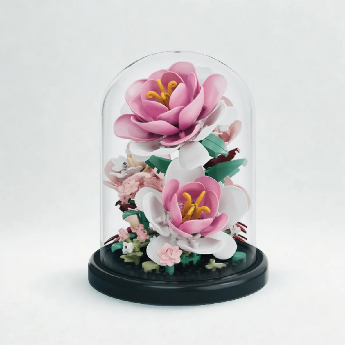 Elegant pink and white flower block display set under a clear dome cover on a black base — a creative DIY floral model kit from QualiBoxz for mindful crafting and home decoration.