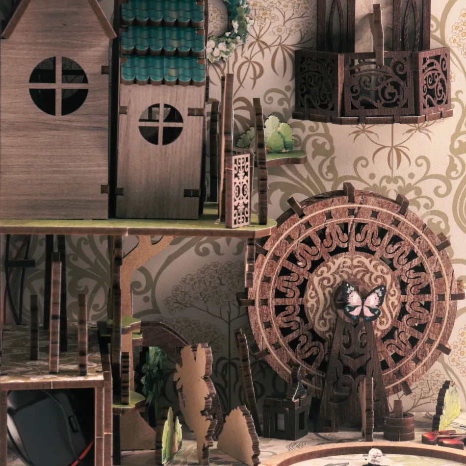 Wooden toy house with decorative elements on a patterned wall