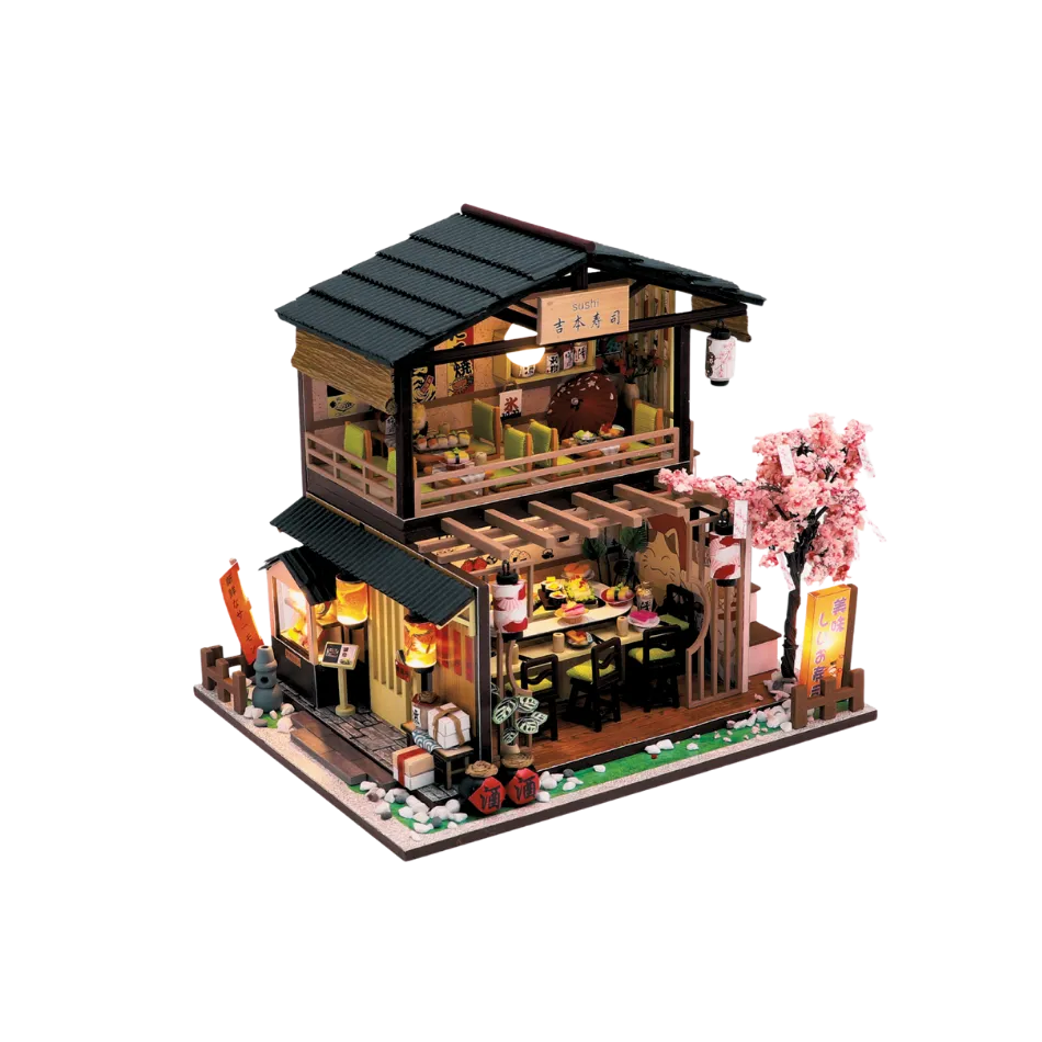 Model of a traditional Japanese restaurant with cherry blossom tree on a white background