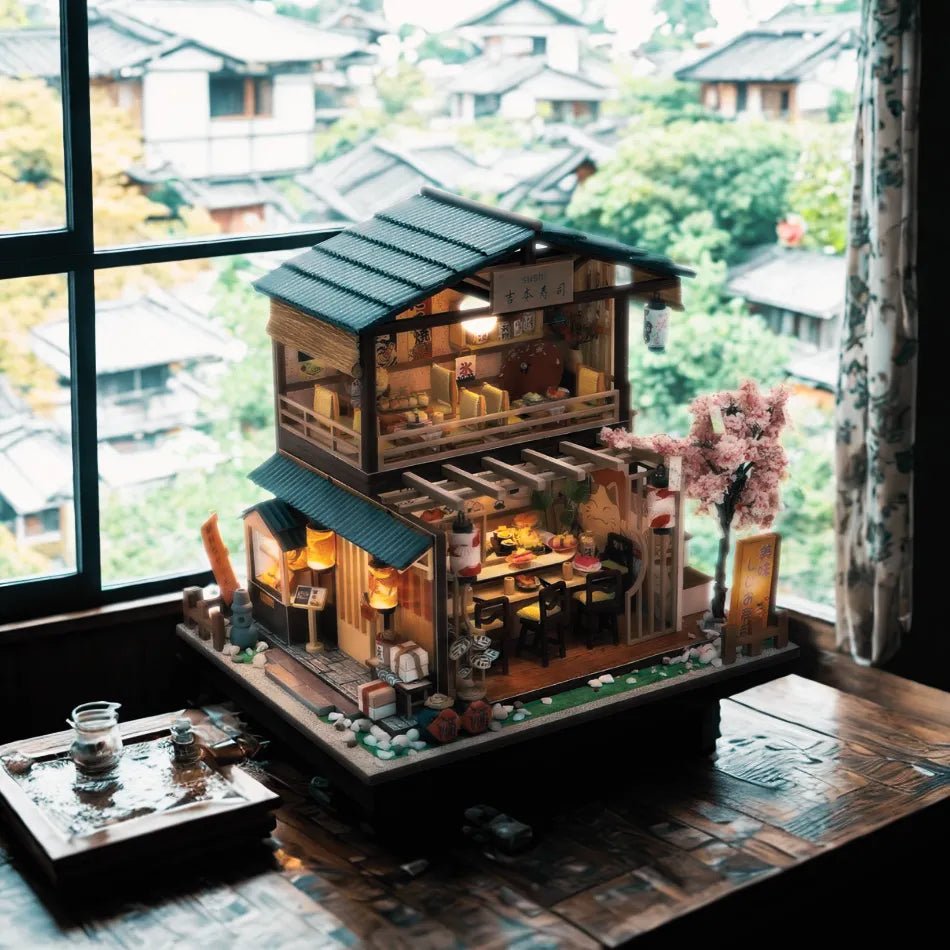Detailed model of a traditional Japanese house on a table with a scenic background