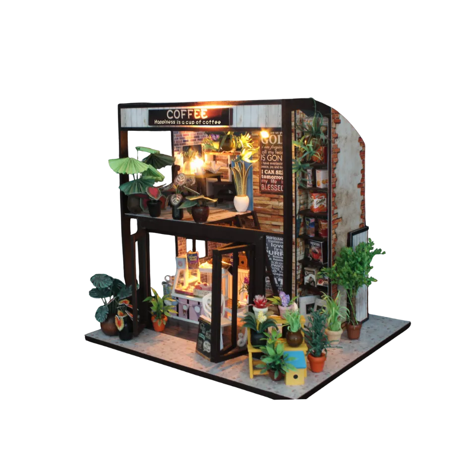 Miniature model of a coffee shop with plants and decor on a white background