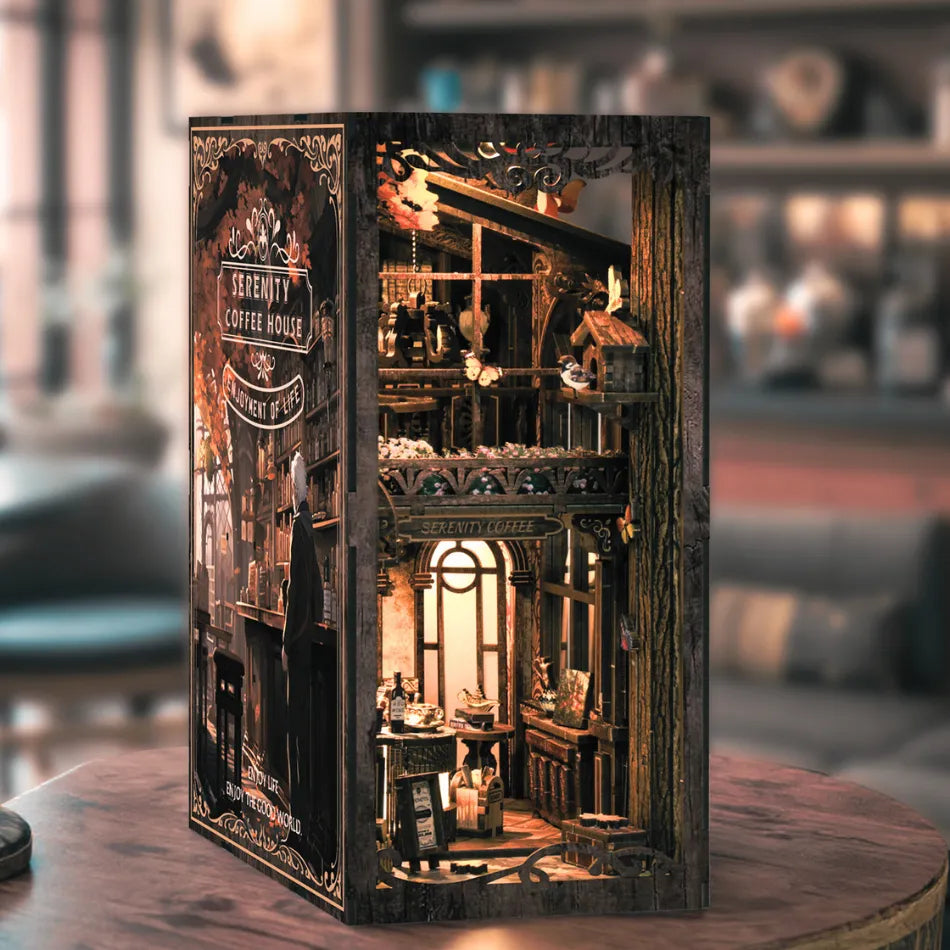 Decorative coffee house model on a table with a blurred background